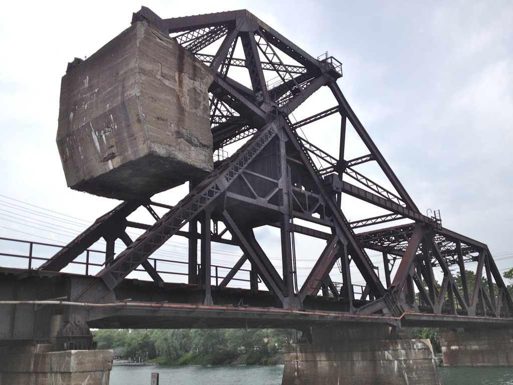 Taken from the north side of the canal, west side of the bridge, looking up at the concrete counterweight.